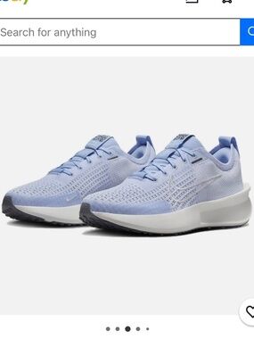 Nike Women’s size 9.5 Interact Run sneakers BRAND NEW